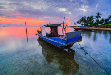 boats at sunset in  Melayu beach , Batam Island 
