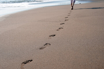footprints on the beach