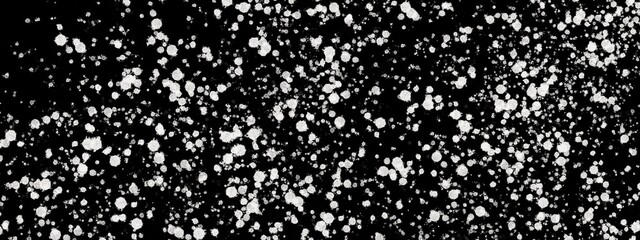 snowflakes abstract white color drop on black background