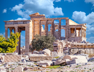 Athens Acropolis Greece, Erechtheion ancient temple under blue sky with some white clouds