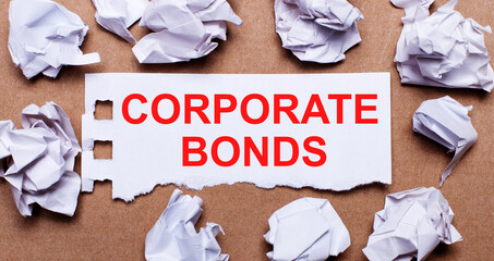 CORPORATE BONDS written on white paper on a light brown background.