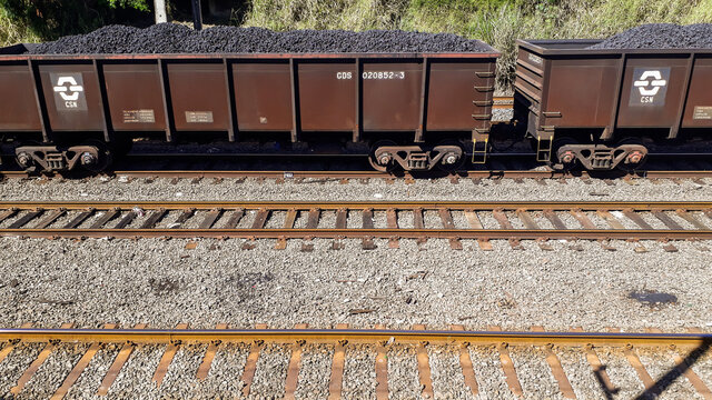 loading of iron ore in CSN train cars. ore production. Mining and rail freight. Brazilian steel company