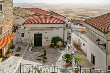 Candela, Italy, June 23, 2021. A courtyard among the small old houses in the historic center of the...