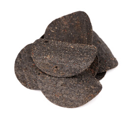 Black potato chips isolated on white background. Black chips with activated charcoal and red pepper.