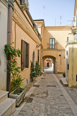 A narrow street in Candela, an old town in the Puglia region of Italy.