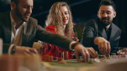 Two bearded men and young woman are talking make bets gambiling in a casino. Entertainment industry and luxury lifestyle. Concept of casino gambling and poker.