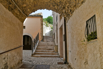 Fototapeta na wymiar A narrow street in Candela, an old town in the Puglia region of Italy.