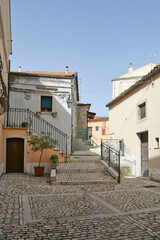 A narrow street in Candela, an old town in the Puglia region of Italy.