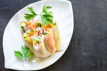 spring roll Nem vegetable rice paper dish on the table healthy meal snack copy space food background rustic. top view