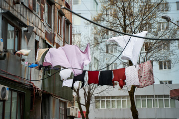 Household traditions in Georgia. Linen and clothes are dried outside on balconies and ropes between buildings