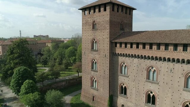 Aerial footage drone view of monuments and skyline of Pavia, beautiful old city town in Italy // no video editing
