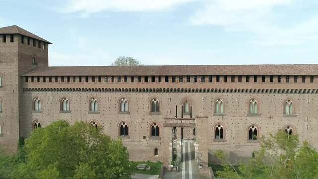 Aerial footage drone view of monuments and skyline of Pavia, beautiful old city town in Italy // no video editing
