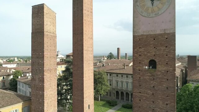 Aerial footage drone view of monuments and skyline of Pavia, beautiful old city town in Italy // no video editing
