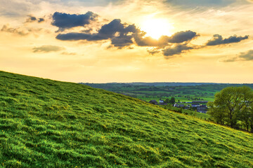 sunset over the fields wales, uk