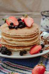 Pancake with strawberry and honey