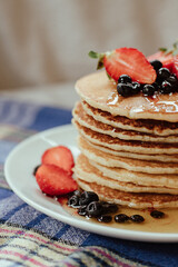Pancake with strawberry and honey