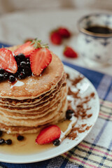 Pancake with strawberry and honey