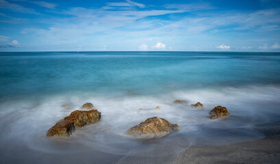 Long exposure of rocks on the shore of the  Gulf of Mexico at Caspersen Beach in Venice Florida in the USA
