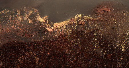 Gold and bronze grunge dark wall. Abstract painting blots background. Alcohol ink colors. Marble...