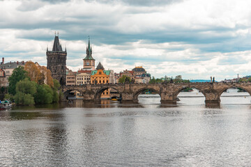 Fototapeta na wymiar Prague magic city and one of its incredible medieval bridges.