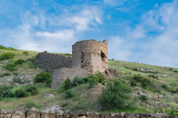View tower of Chembalo fortress. Medieval architecture monument, landmark. Ruined stone Genoese...