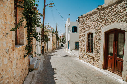 Empty street of Malia at noon. 