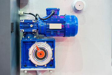 close up reducer gearbox and electric motor install at manufacturing machine for industrial