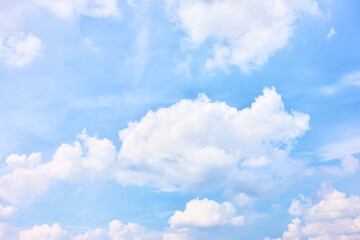 Sky with white heap clouds - background