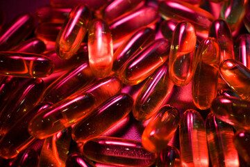  capsules under red  lighting