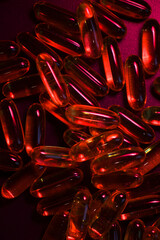  capsules under red  lighting