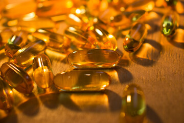 capsules on a wooden table