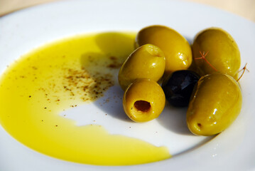 Healthy food made of olives and extra virgin olive oil