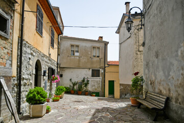 A small street between the old houses of Belmonte del Sannio, a medieval village in the Molise region.