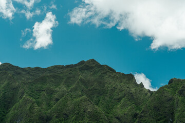 Koolau Range, Hoomaluhia Botanical Garden, Honolulu, Oahu, Hawaii. Koʻolau Range is a name given to the dormant fragmented remnant of the eastern or windward shield volcano of  Oahu