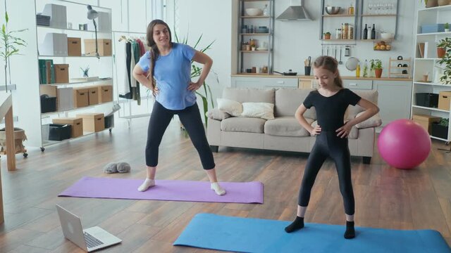 Pregnant Mother and Child go in for Sports at Home Online. Home Isolation. Fitness at Home. Family Quarantine. Sports Kid. Sport Family.