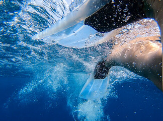 Flippers in ocean of South Ari Atoll, Maldives