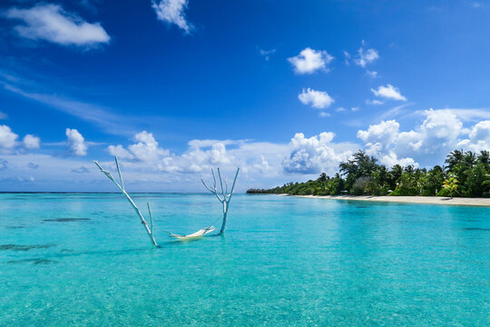 Relaxing hammock in lagoon of South Ari Atoll, Maldives