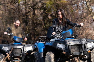 Plakat Couple Driving Off-road With Quad Bike or Atv