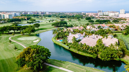 aerial drone shot of Golf course in Boca Raton, Florida with city