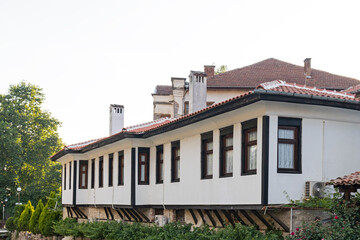 Fototapeta na wymiar Typical street and old houses in historical town of Melnik, Bulgaria