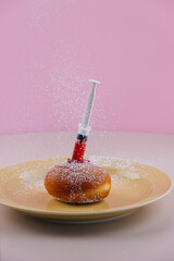 stuffed donut in a syringe