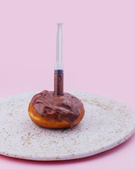 stuffed donut in a syringe