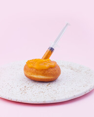 stuffed donut in a syringe