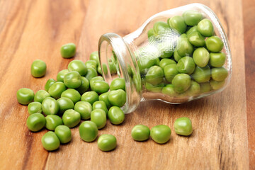 Fresh peas on white background