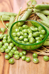 Fresh peas on white background