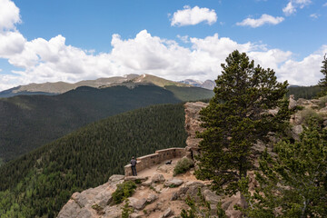 Fototapeta na wymiar Hiker at mountain overlook in Colorado, USA.