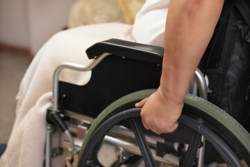 Close up of a person in a wheelchair