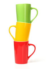 red, yellow and green cups on white background