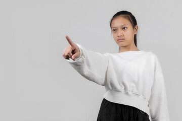 Asian little girl studio portrait on gray background