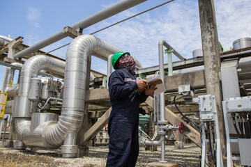 Male worker inspection pipeline oil